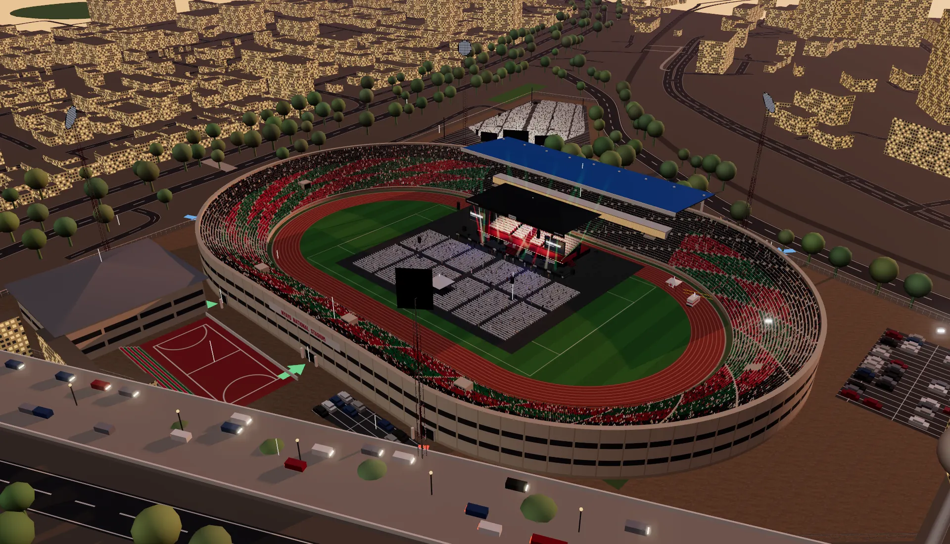 Nyayo National Stadium from the air at dusk, with the concert stage on the pitch and the streets around it